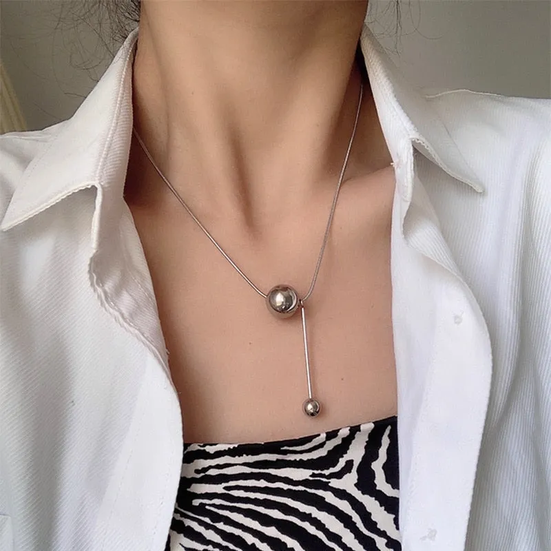 Fashion geometric snake bone chain titanium steel ball pendant necklace