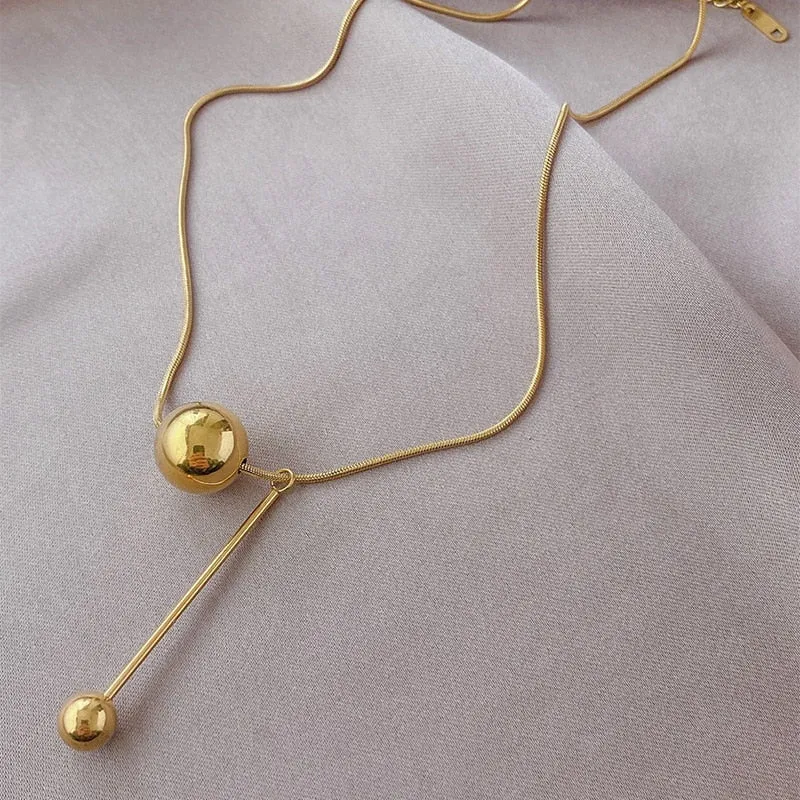 Fashion geometric snake bone chain titanium steel ball pendant necklace