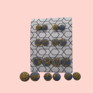 Grey fabric button studs with yellow cat design.
