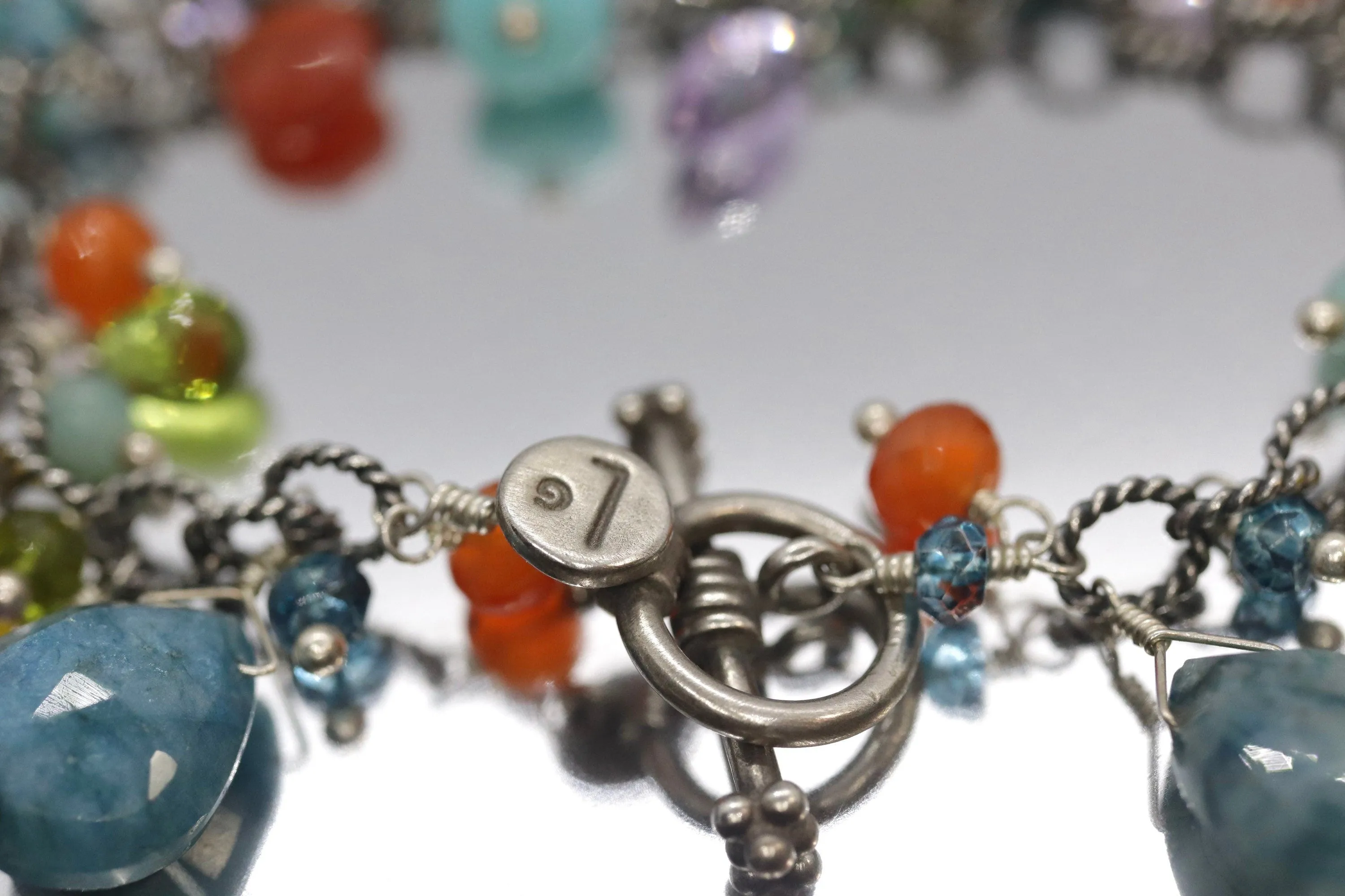 Laura Gibson Bracelet. Sterling Silver with Dangling Faceted Gems - Amazonite Amethyst(435)