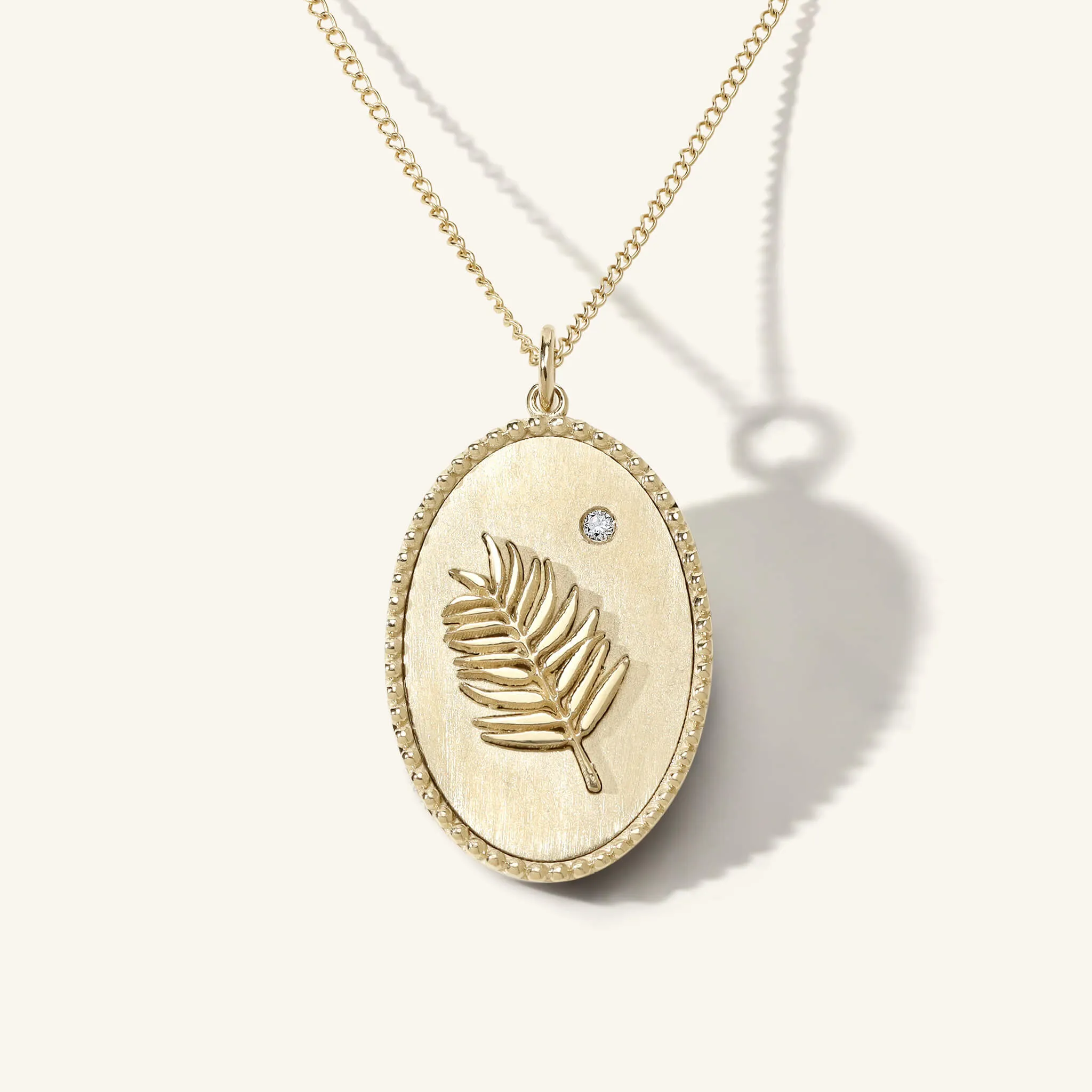 Palm Leaf Token Necklace