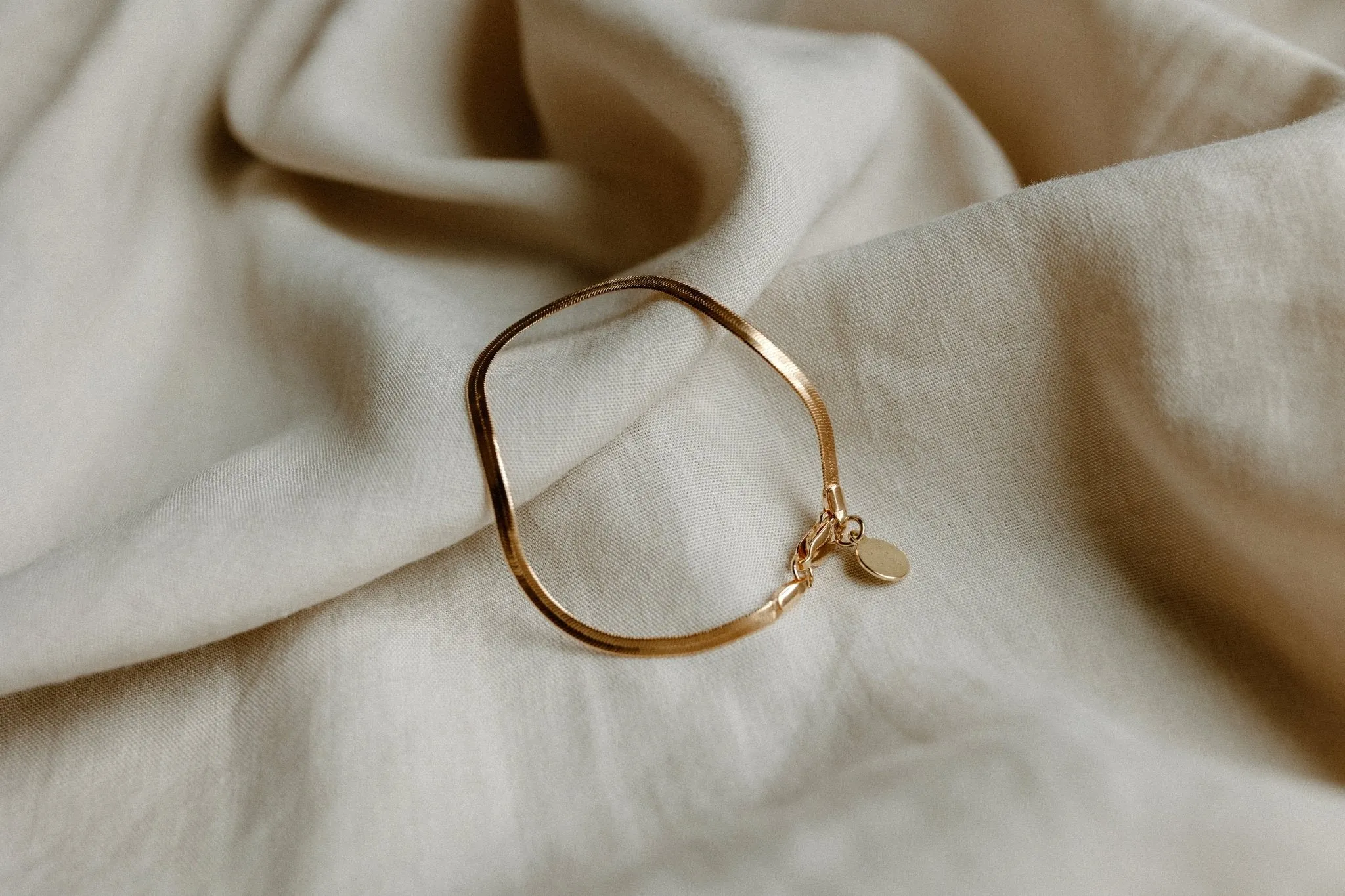 Slinky Gold Herringbone Chain Bracelet